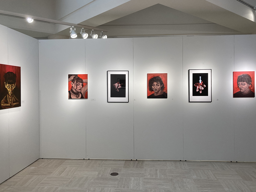 Inside front wall interchange of Terry photos and Lemke paintings